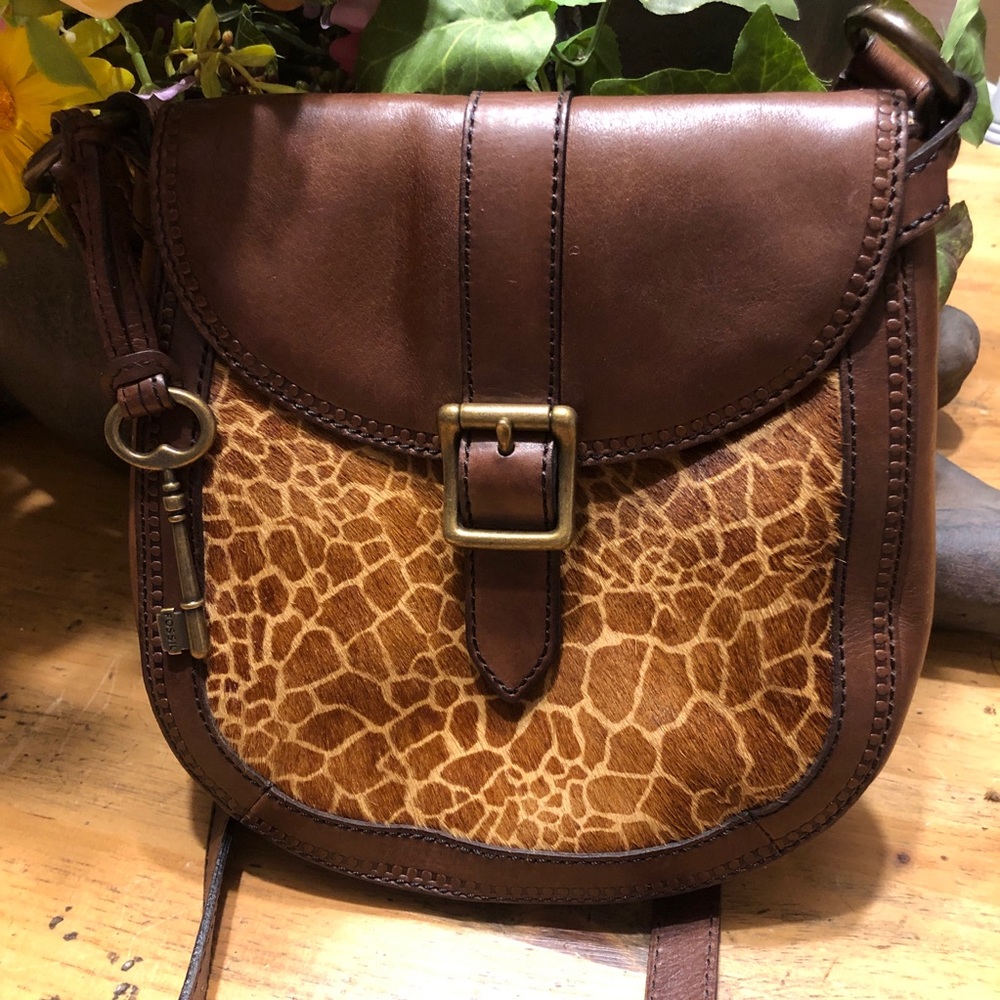 Used fossil leather crossbody giraffe print bag